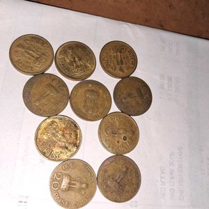 10 brass twenty paisa coins
