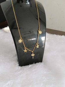 Delicate Gold Flower &amp; Key Necklace