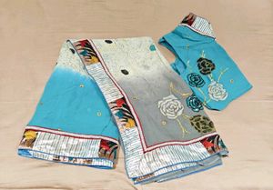 Chiffon saree with a print blouse