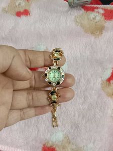 Elegant Women's Gold Watch with Crystal Accents