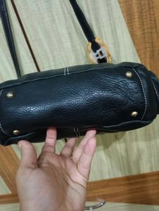 Chic Navy Leather Shoulder Bag with Flower Accent