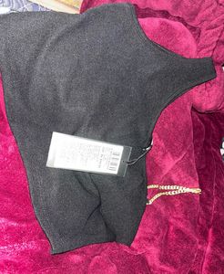 Chic Black One-Shoulder Top with Gold Chain