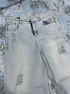 Light Wash Ripped Wide Leg Jeans