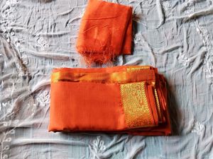 Vibrant Orange Saree with Golden Border