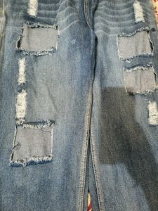 Distressed Patchwork Denim Jeans