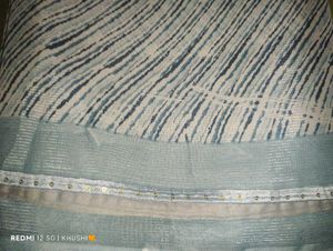 Elegant Blue Saree with Unique Pattern