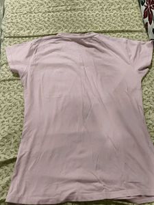 a pink top