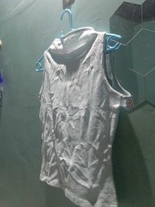 White Sleeveless Mock Neck Top