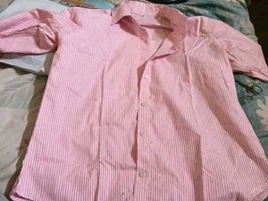 Striped and plain pink shirt