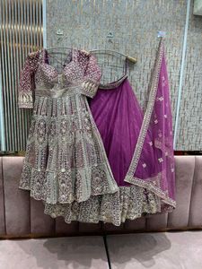 Exquisite Red Embellished Lehenga Choli