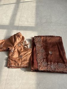 Elegant Brown Saree with Embellished Blouse