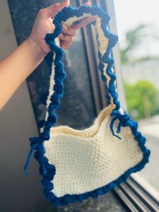 Crocheted Bag with Flower Accent