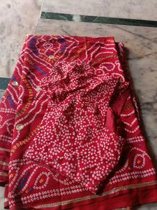 Vibrant Red Bandhani Saree with Intricate Designs