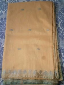 Elegant Peach Saree with Silver Border