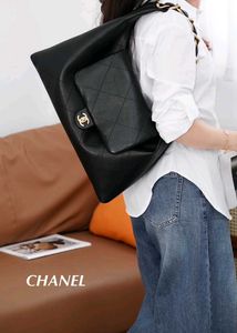 Chanel Maxi CC Hobo crafted in supple calfskin wit