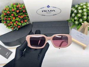Prada Sunglasses - Chic Pink Tinted Lenses