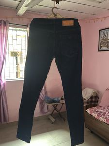 Dark Wash Ripped Jeans by Roadster