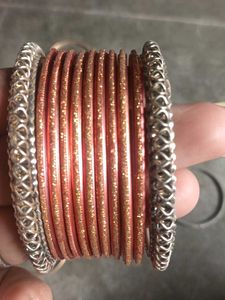 Sparkling Orange Bangles with Silver Accents