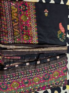 Elegant Black Saree with Intricate Peacock Motifs