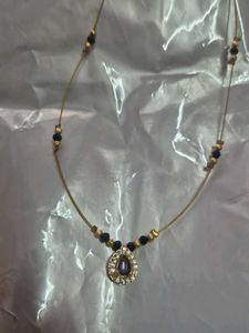 Elegant Gold Necklace with Emerald Pendant
