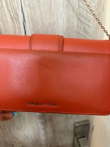 Vibrant Orange Clutch with Gold Hardware