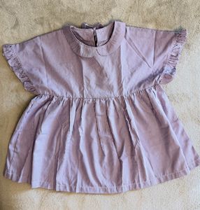 Women’s Top- Cute, loose fit w/ Ruffle Sleeve