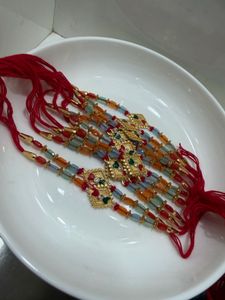 Set of 12 Beaded Gold-Tone Rakhi Bracelets