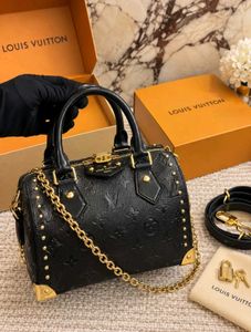 Louis Vuitton Speedy-style studded trunk handbag w