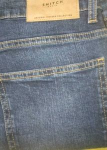 Distressed Blue Denim Jeans