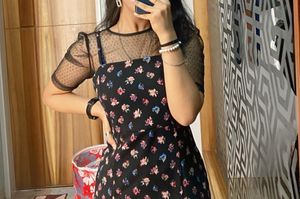Chic Floral Mini Dress with Sheer inner