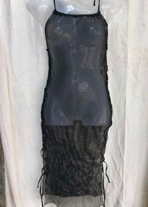 69. Black sheer bodycon