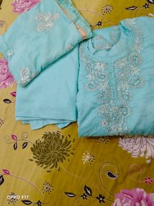 stitched suit with zipper storage  packet.