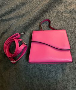 brand new Barbie pink bag with crossbody strap
