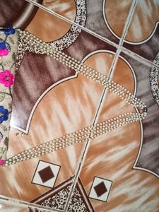 Embroidered Clutch with Pearl Strap