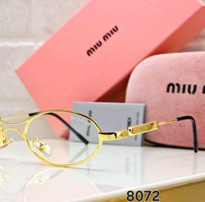 Miu Mi Oval Sunglasses