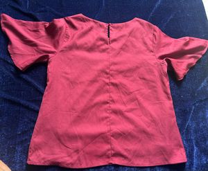 Elegant Maroon Top with Embellished Neckline