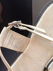 White Flat Sandals with Silver Detail