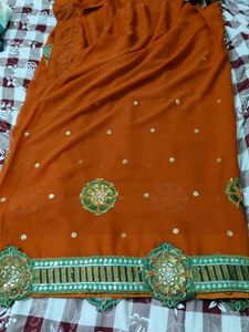 beautiful rust saree perfect for occasions