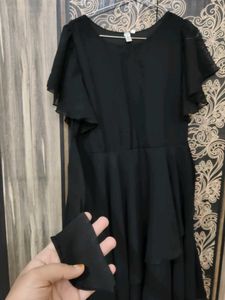 black flared dress