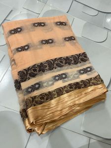 Elegant Peach Saree with Floral Border