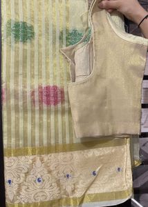 Elegant Cream Saree with Gold &amp; Pink Motifs
