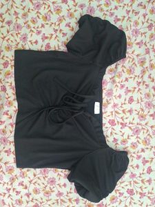 Puffed sleeve vest ruffle top in black