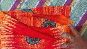 Vibrant Red Saree with Intricate Designs