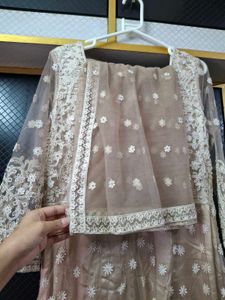 Elegant Beige Embroidered Anarkali gown