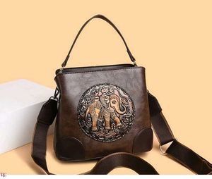 Embossed Elephant Bucket SlinG/Bag
