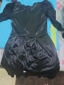 Elegant Black Dress with Gold Buttons