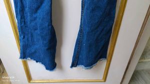 Trendy Flared Jeans with Ripped Knees