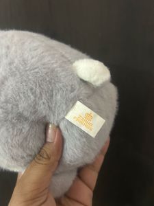 grey and white koala plush toy featuring a large