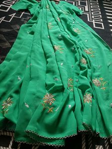 Elegant Green Embroidered Saree with readymade blo