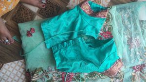 Beautiful mint green net  embroidered saree